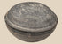 Ancient Chinese gray pottery covered bowl attributed to the Tang Dynasty, shown closed with shallow domed lid and aged earthenware surface.