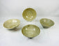Set of four Song Dynasty celadon-glazed terracotta bowls 12th century CE