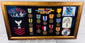 United States Navy veteran memorial display with photograph, awards, and embroidered emblems