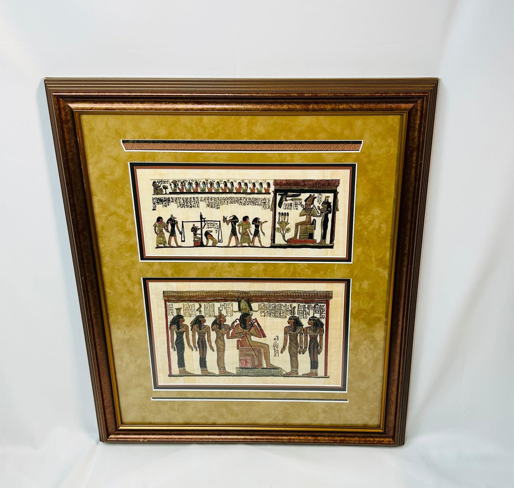 Framed Ancient Egyptian papyrus artwork depicting ritual and funerary scenes with deities and hieroglyphs, double-matted in gold and black frame, modern reproduction on papyrus