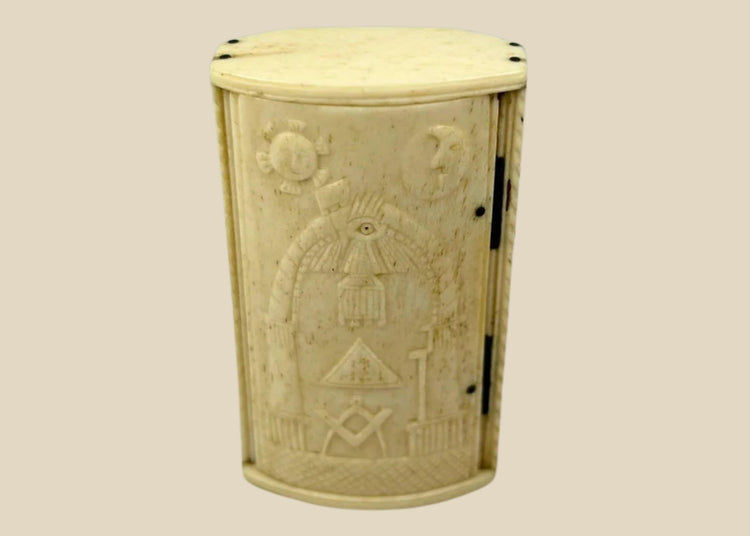 Antique Napoleonic Wars snuff box, hand-carved bone with Masonic symbols including Square and Compasses, All-Seeing Eye, Sun and Moon, crafted by French POWs in Britain circa 1795–1815.