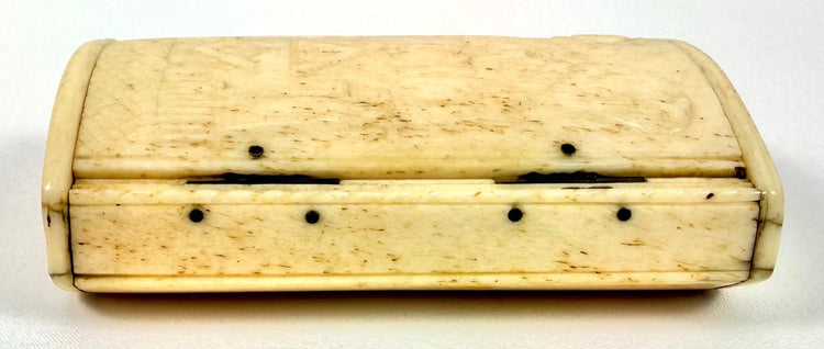 Antique Masonic bone snuff box with a hollow interior compartment and original iron-pin hinged construction.