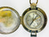 French pocket compass with brass case and sighting lens, early 20th century.