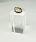 Roman Imperial period bronze signet ring photographed on neutral background.