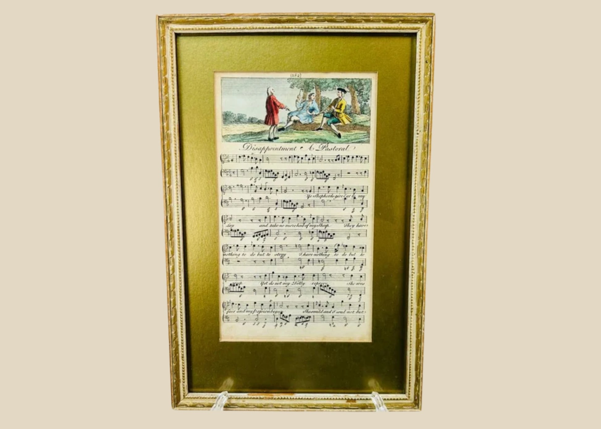Georgian era 18th-century engraved sheet music with hand-colored pastoral scene, depicting figures in a countryside setting above musical notation; mounted in a gilt frame with velvet backing, showcasing fine period engraving, early music history, and decorative art appeal.