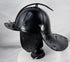 Antique European military helmet from the Thirty Years' War era with articulated neck guard and forged iron construction.