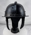 Seventeenth-century German or Dutch forged iron helmet featuring radiating flutes and original ring finial.