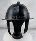 Seventeenth-century German or Dutch forged iron helmet featuring radiating flutes and original ring finial.