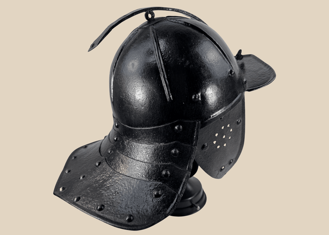 Authentic mid-17th century forged iron military helmet with black painted finish, adjustable nasal bar, and articulated neck guard.