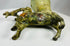 Bronze ceremonial vessel with centaur figure and flared rim design
