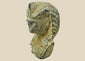 Carved limestone pharaoh head with nemes headdress and uraeus cobra motif, European Grand Tour collectible circa 1800–1920 on neutral background.