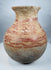 Ancient Central American pottery with red geometric decoration