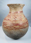 Ancient Central American pottery with red geometric decoration