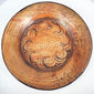 Oblique view of Pre-Columbian Central American ceramic bowl displaying painted interior and shallow profile