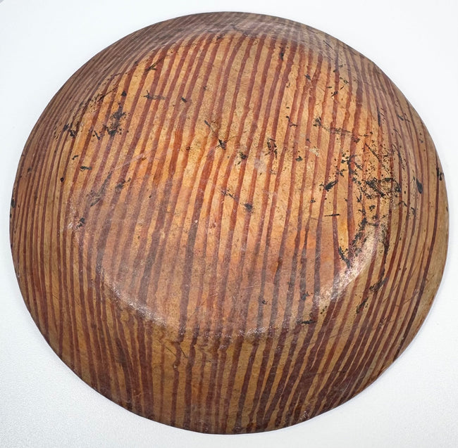 Underside of Greater Nicoya Pre-Columbian ceramic plate with closely spaced reddish-brown painted lines