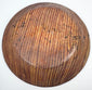 Underside of Greater Nicoya Pre-Columbian ceramic plate with closely spaced reddish-brown painted lines