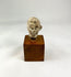 Front view of Greco-Roman terracotta head of a boy from 1st century BCE–1st century CE.