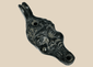 Antique grotesque satyr-form oil lamp with cast metal construction and dark aged patina, Europe, 19th century.