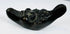 Antique cast metal oil lamp in the form of a satyr head with filling aperture and wick nozzle.