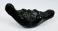 European decorative oil lamp showcasing a grotesque mask design inspired by classical mythology.
