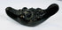 Antique cast metal oil lamp in the form of a satyr head with filling aperture and wick nozzle.