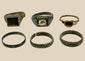 Group of six Late Roman to Early Byzantine bronze finger rings with varied bezel and band designs, circa 3rd–7th century CE