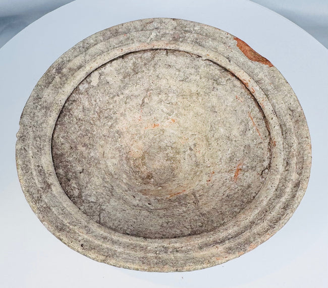 Pair of Roman North African earthenware bowls displaying mineral deposits, burial encrustation, and ancient wear.
