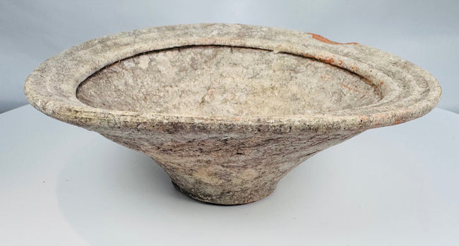 Ancient Tunisian terracotta bowl vessels from the Roman Empire with shallow basins and ringed rims.