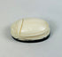 Hand-carved East Asian scarab-form talisman mounted on dark oval base