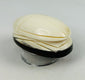 Carved symbolic scarab-shaped talisman from East Asia with elegant layered detailing
