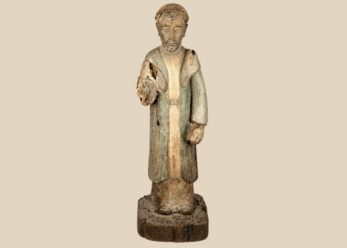 Spanish Colonial hand-carved wooden santo figure with aged patina