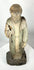 Spanish Colonial santo sculpture with integral base and weathered surface