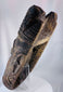 Large tribal mask from West Africa displaying dramatic ceremonial features and traditional craftsmanship.