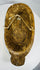 Vintage African mask with elongated form and natural wear