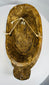 Vintage African mask with elongated form and natural wear