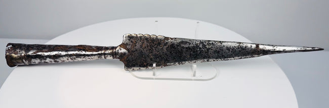 Ancient European iron spearhead with scalloped-edge blade and socketed base, circa 1st millennium CE