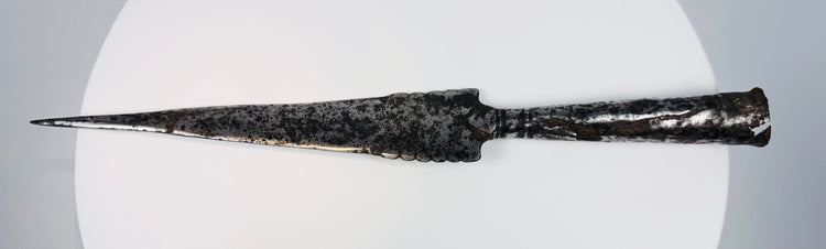 Antique forged iron spearhead showing leaf-shaped blade, socket construction and historic brazed repair