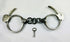 Vintage Tower Detective-style handcuffs with key, United States, early 1900s