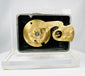 Antique brass dial safe lock front showing engraved numbers and maker mark