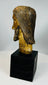 Fragment of religious sculpture depicting Christ with solemn expression