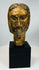 Carved wooden Christ head with expressive facial features