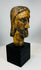 European devotional sculpture of Christ with aged paint remnants
