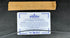 Reverse of conservation-framed American military document with archival labels