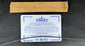 Reverse of conservation-framed American military document with archival labels