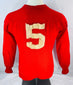 Reverse view of red Sages hockey sweater displaying applied number 5
