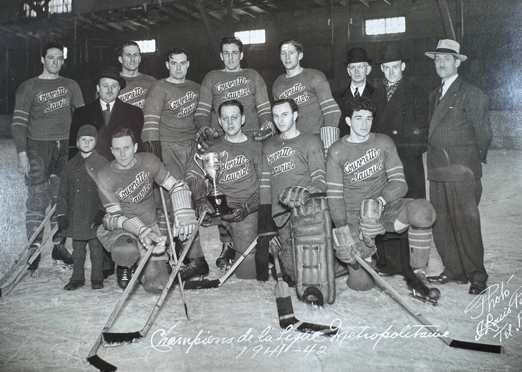 Original 1941–1942 Couvrette & Sauriol championship team photograph with league trophy