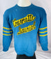 Front view of blue Couvrette & Sauriol wool hockey sweater with yellow felt lettering