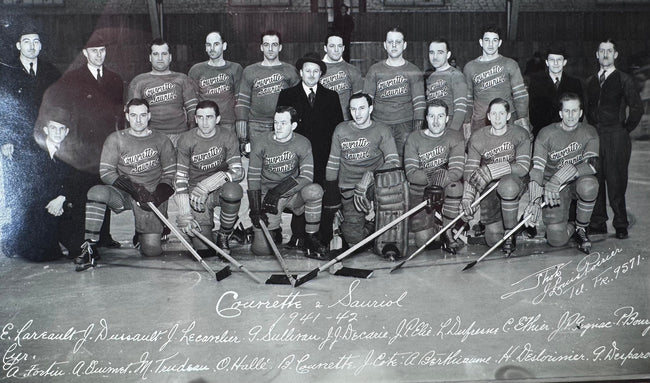 Historic Montreal hockey team portrait showing players in Couvrette &amp; Sauriol sweaters