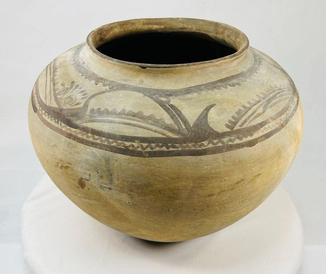 Side view of an early 20th-century painted terracotta water vessel from Hidalgo, Mexico
