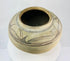 Profile view of a rounded Huastec-style terracotta water vessel